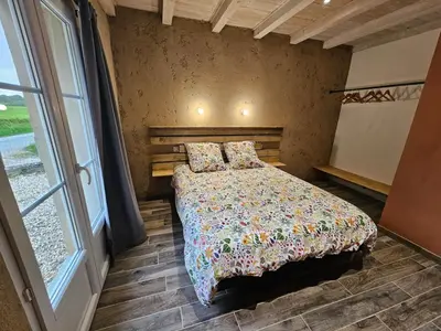 Un ou plusieurs lits dans un hébergement de l'établissement Le Clos Simonin