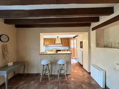 Cuisine ou kitchenette dans l'établissement Maison au cœur des prés