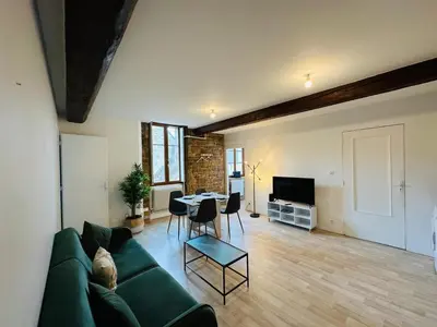 Coin salon dans l'établissement Charmant appartement centre Dijon