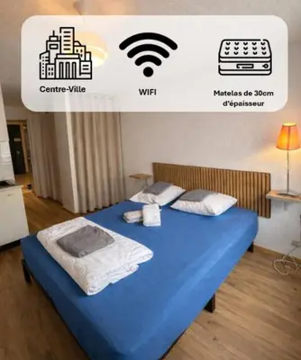 Un ou plusieurs lits dans un hébergement de l'établissement Logis, appartement, 220 élégant et central