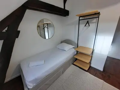 Un ou plusieurs lits dans un hébergement de l'établissement Le Château d'Eau - Maison, 80m2, Lumineuse & Calme