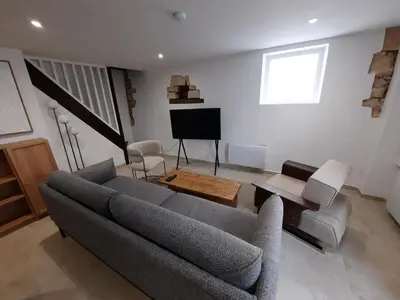 Coin salon dans l'établissement Le Château d'Eau - Maison, 80m2, Lumineuse & Calme