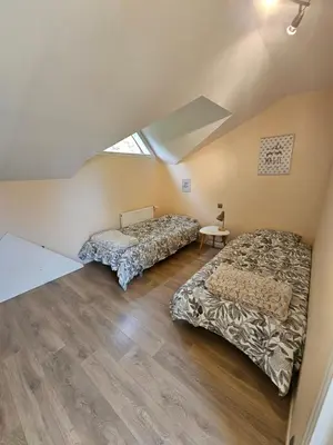 Un ou plusieurs lits dans un hébergement de l'établissement Gîte Rendez vous en Morvan