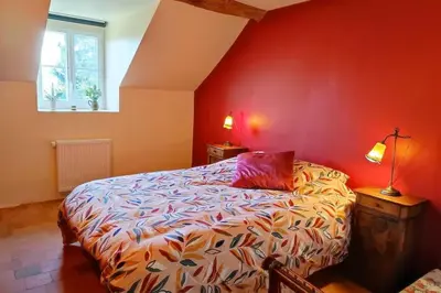 Un ou plusieurs lits dans un hébergement de l'établissement Gite le Villaine
