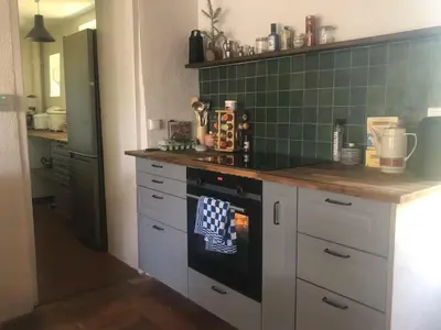 Cuisine ou kitchenette dans l'établissement Gite le Villaine