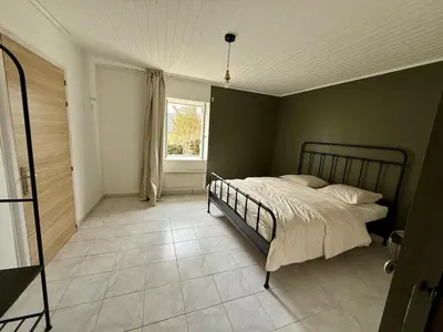 Un ou plusieurs lits dans un hébergement de l'établissement Gîte 2 suites proche du lac de Chalain