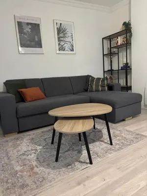 Coin salon dans l'établissement T2 4 pers rénové au cœur du centre historique Place de la Libération