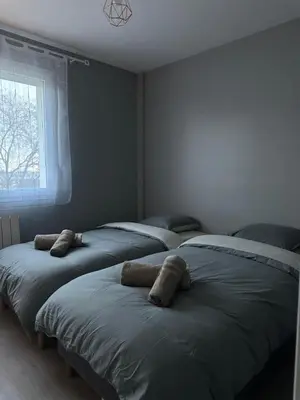Un ou plusieurs lits dans un hébergement de l'établissement Bel Appartement-T3 Lumineux