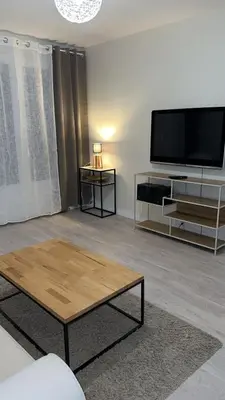 Télévision ou salle de divertissement dans l'établissement Bel Appartement-T3 Lumineux