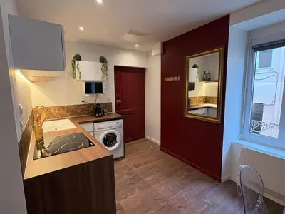 Cuisine ou kitchenette dans l'établissement Le Martini