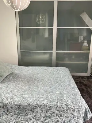 Un ou plusieurs lits dans un hébergement de l'établissement Loft atypique, charme & confort