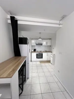 Cuisine ou kitchenette dans l'établissement Ô Calvaire - Cosy, Café offert & Proche Musées