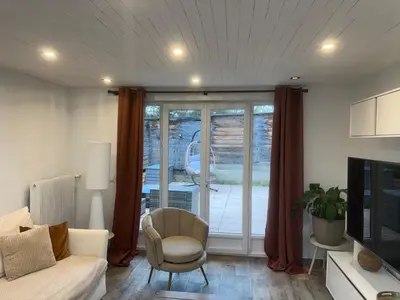 Coin salon dans l'établissement Appartement Cosy terrasse