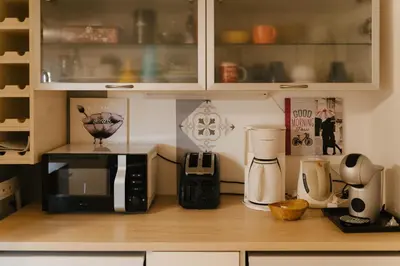 Cuisine ou kitchenette dans l'établissement FERME DE CARACTERE PROCHE DE Dole JURA