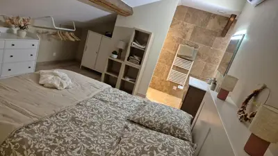 Un ou plusieurs lits dans un hébergement de l'établissement Love room- Le Cocon Osé