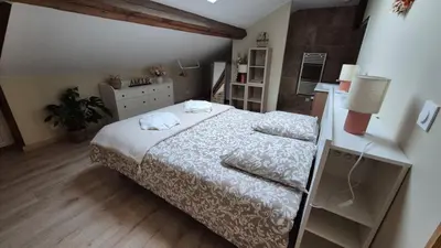 Un ou plusieurs lits dans un hébergement de l'établissement Love room- Le Cocon Osé