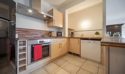 Cuisine ou kitchenette dans l'établissement Grand 70m2 - Gare à pied - Fibre - Parking