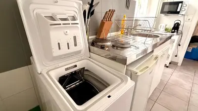 Cuisine ou kitchenette dans l'établissement Le Mars - 2 voyageurs - Republique - Central