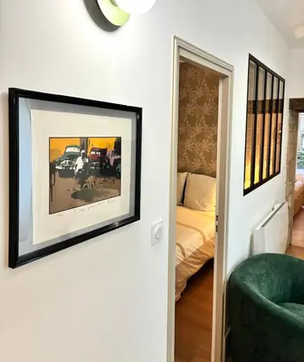 Un ou plusieurs lits dans un hébergement de l'établissement Appartement de 60 m2 avec 2 chambres, Dijon cœur de ville
