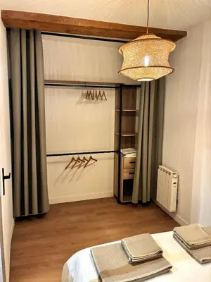 Un ou plusieurs lits dans un hébergement de l'établissement Appartement de 60 m2 avec 2 chambres, Dijon cœur de ville