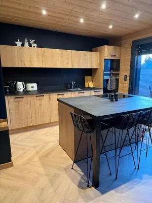 Cuisine ou kitchenette dans l'établissement Le Petit Nid D'Amour