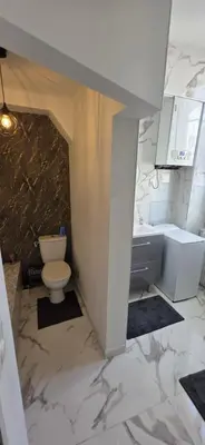 Salle de bains dans l'établissement Le Bourg