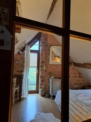 Un ou plusieurs lits dans un hébergement de l'établissement maison la Bambine chambre esprit château