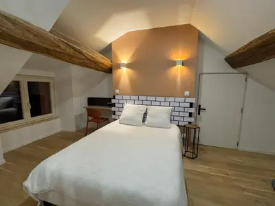 Un ou plusieurs lits dans un hébergement de l'établissement Insolite, Familial en 3 étoiles, Truffe et Spa