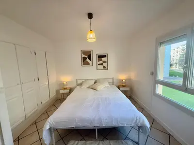 Un ou plusieurs lits dans un hébergement de l'établissement Apartment for 4 people
