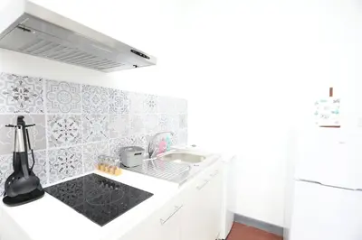 Cuisine ou kitchenette dans l'établissement Appartement Cosy - Proche du Centre-Ville