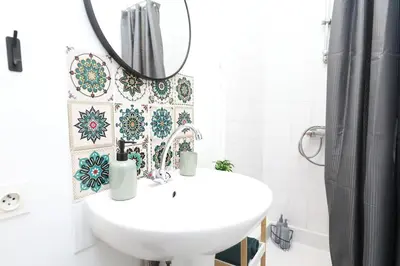 Salle de bains dans l'établissement Appartement Cosy - Proche du Centre-Ville