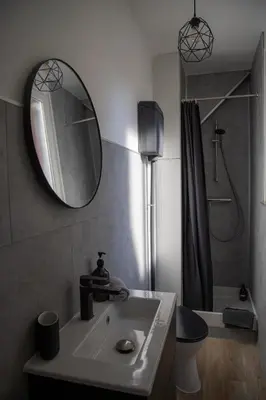 Salle de bains dans l'établissement Le Millésime