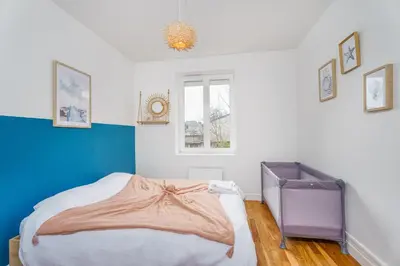 Un ou plusieurs lits dans un hébergement de l'établissement Evasion Paisible - Proche parcs