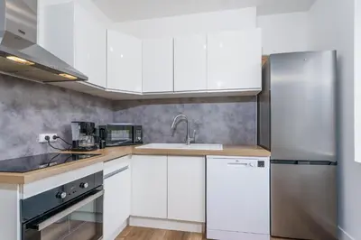 Cuisine ou kitchenette dans l'établissement Evasion Paisible - Proche parcs