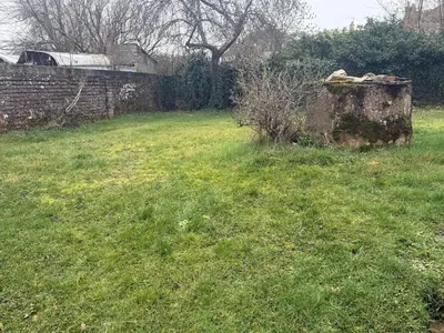 Jardin de l'établissement Maison conviviale à Rouvray avec jardin - 30 m²