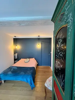 Un ou plusieurs lits dans un hébergement de l'établissement Au bord d'Arroux