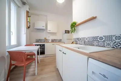 Cuisine ou kitchenette dans l'établissement Le Jean Moulin 3