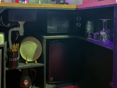 Cuisine ou kitchenette dans l'établissement Ruby Room