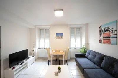 Télévision ou salle de divertissement dans l'établissement Le Relais de la Gare