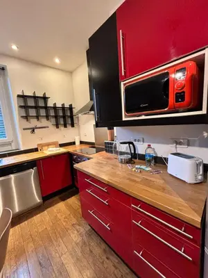 Cuisine ou kitchenette dans l'établissement Charmant T2 - Proche Centre ville