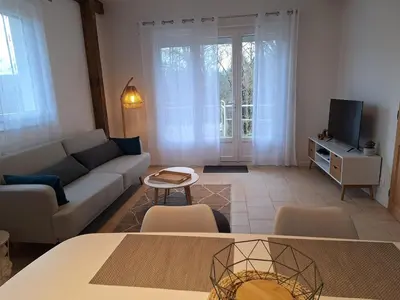 Télévision ou salle de divertissement dans l'établissement Escapade au Lac
