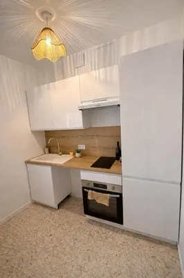 Cuisine ou kitchenette dans l'établissement Le Nid de Lily