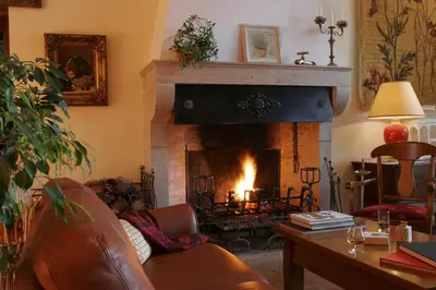 Coin salon dans l'établissement Hôtel Le Clos