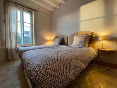 Un ou plusieurs lits dans un hébergement de l'établissement Gîte La Maison De Lucien