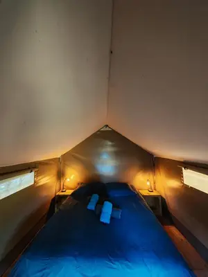Un ou plusieurs lits dans un hébergement de l'établissement Camping Du Paquier Fané