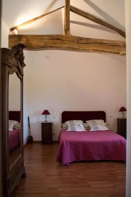 Un ou plusieurs lits dans un hébergement de l'établissement Domaine Joseph LAFARGE Wine Resort B&B