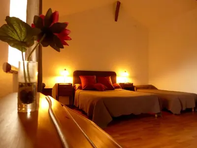 Un ou plusieurs lits dans un hébergement de l'établissement Domaine Joseph LAFARGE Wine Resort B&B