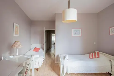 Un ou plusieurs lits dans un hébergement de l'établissement Maison De Charme En Bourgogne