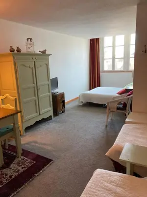 Un ou plusieurs lits dans un hébergement de l'établissement Studio Lumineux, Coeur De Ville