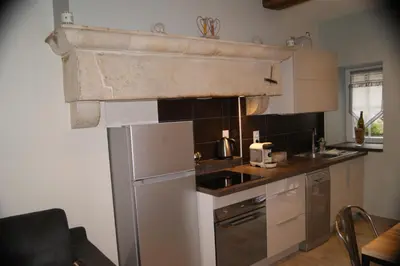 Cuisine ou kitchenette dans l'établissement Gite le murger